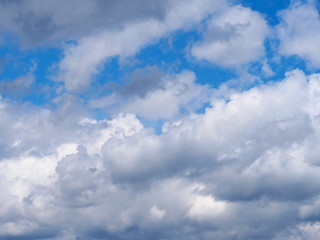 Fototapeta premium Gray clouds on a blue sky background