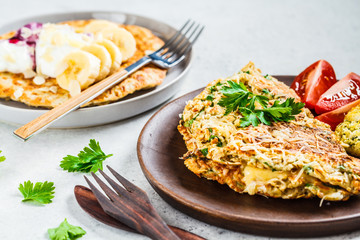Oatmeal omelet with cheese and sweet oatmeal pancake. Healthy breakfast concept.