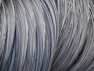 Roll of metal wire of silver color. Building material