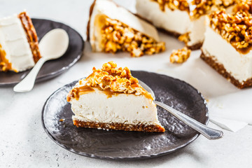 Raw vegan cashew cheesecake with caramel popcorn. Raw vegan dessert concept.
