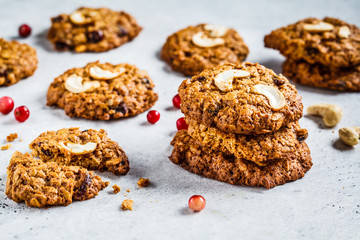 Healthy oatmeal cookies with cranberry and nuts. Healthy vegan food concept.