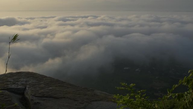 Morning mood and fog on mountain and sun with colorful clouds beatiful. Landscape sea fog and Sunrise Khao Phra Ya Dern Thong View Point. Phatthana Nikhom, Lopburi Thailand
