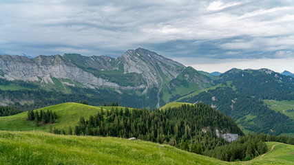 Fototapeta na wymiar Panoramic view from Niederbauen on green Swiss Alps near lake Lucerne