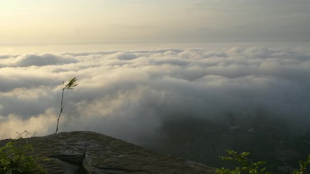 Morning mood and fog on mountain and sun with colorful clouds beatiful. Landscape sea fog and Sunrise Khao Phra Ya Dern Thong View Point. Phatthana Nikhom, Lopburi Thailand