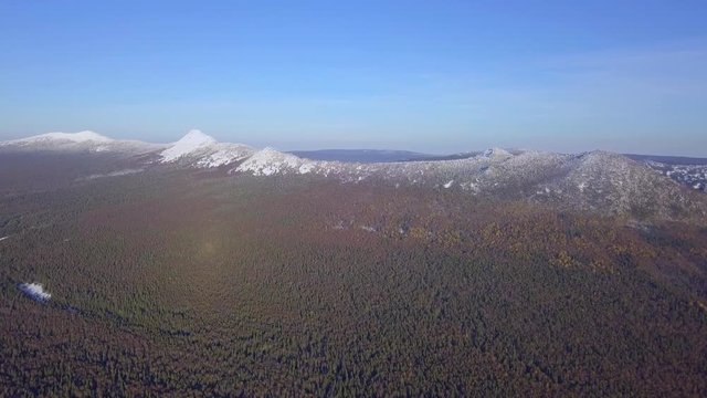 Taganay Mountain Ridge Peak Covered with Snow. Winter in Taganay National Park in the Urals, Russia. Aerial View