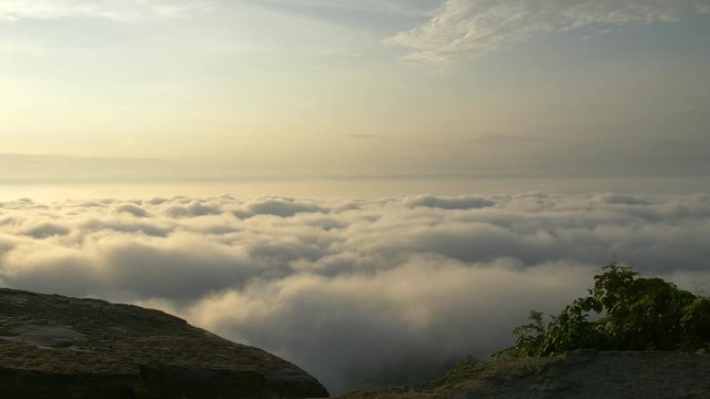 Morning mood and fog on mountain and sun with colorful clouds beatiful. Landscape sea fog and Sunrise Khao Phra Ya Dern Thong View Point. Phatthana Nikhom, Lopburi Thailand