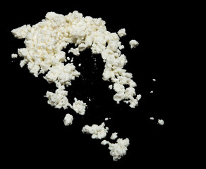 white cottage cheese on a black background