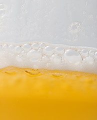 foam with beer bubbles as background