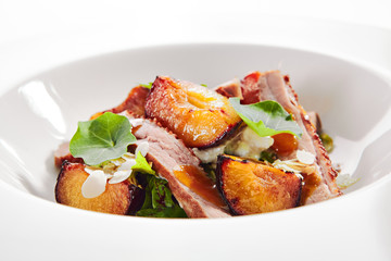 Salad with Roasted Duck Breast, Baked Pear and Strachatella