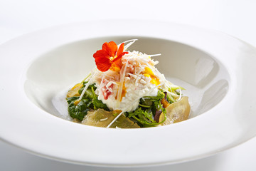 Red king crab with spinach and pear top view