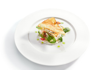 Crab napoleon with pike caviar sauce closeup