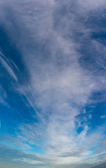 Fantastic soft clouds against blue sky, natural composition - panorama