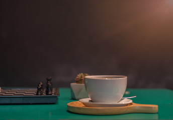 cup of coffee on wooden table