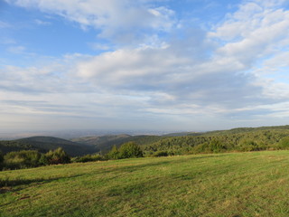 Fototapeta na wymiar Nature landscape blue sky and green hills and meadows
