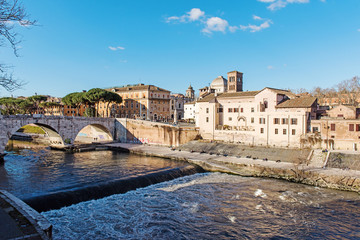 Rome, Italy. Tiber River and stone bridge, Ponte Cestio in Rome. Italy