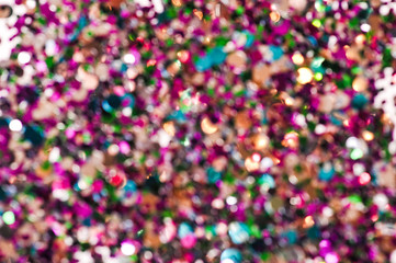 Shiny colour glitters. Abstract rounded glitters ful of colour.