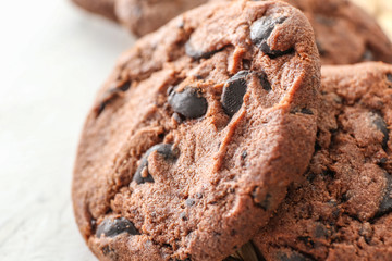 Tasty chocolate cookies on table, closeup