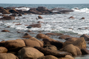 Fototapeta na wymiar Kangaroo Island Australia, boulders rounded by water on seashore at Stokes Bay