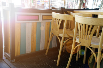 Wooden Vintage chairs in cafe, modern cozy interior
