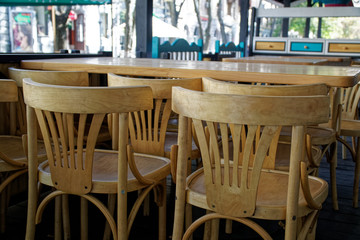 Wooden Vintage chairs in cafe, modern cozy interior