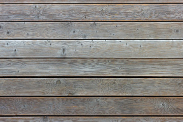 Naklejka premium The wooden plank background
