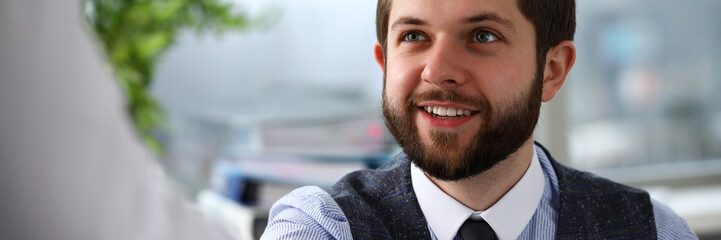 Obraz premium Man in suit and tie give hand as hello in office portrait. Friend welcome mediation offer positive introduction thanks gesture summit executive approval motivation male arm strike bargain