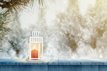 Obraz premium Luminous lantern on wooden table