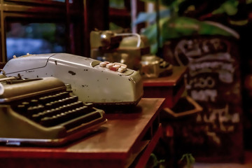 Old typewriters unavailable. Put on display on a table in a coffee shop. In a sense, like a return to the past several years.