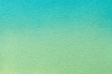 Abstract art background light turquoise and green colors. Watercolor painting on canvas.