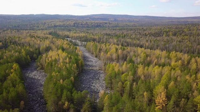 Taganay National Park in Russia in Autumn. Aerial View of "Big Stone River", Biggest Deposit Occurrence of Aventurine Quartz