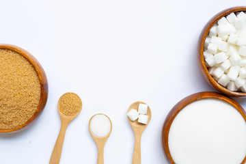Various types of sugar on white background.
