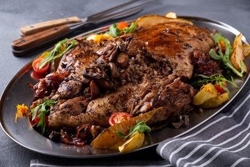 Baked duck stuffed with buckwheat and mushrooms.