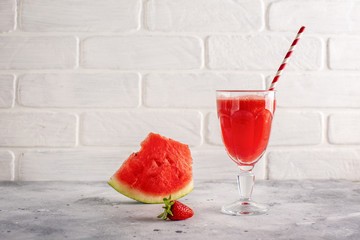 Front view watermelon juice and slide beside