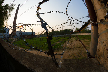 Barbed and razor wire on a fence