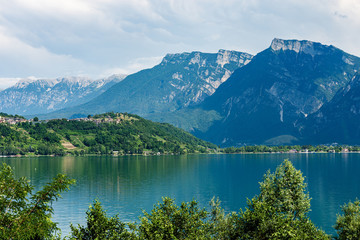 Fototapeta na wymiar Lake Caldonazzo and Italian Alps with the small village of Tenna, Valsugana valley, Trento province, Trentino-Alto Adige, Italy, Europe