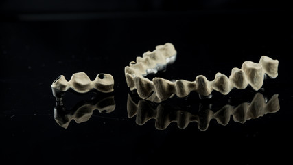 dental implants on a black background