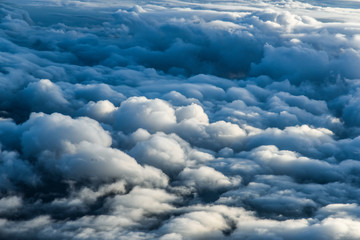 Clouds from airplane. view with blue heavy sky and clouds