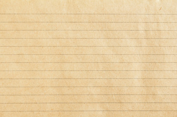 Brown lined craft notebook paper texture background.