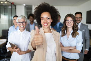 Portrait of business team posing in office