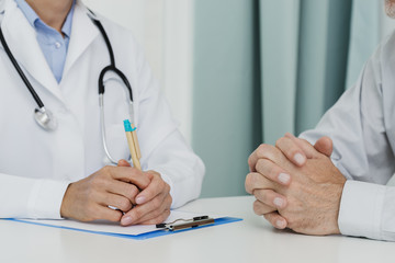 Doctor talking with patient close-up