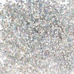 Texture made of silver glitter stars