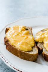 Scrambled Eggs with Bread Slice for Breakfast.
