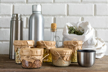 Vegetables and groceries in the kitchen. Storage in ecological friendly dishes, concept of zero waste and no plastic