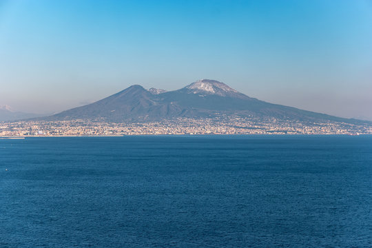 View of snow covered Volcano Vesuvius from Posillipo Hill, Naples, Campania, Italy