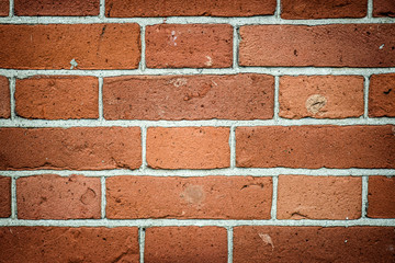 Obraz premium Old vintage brick wall as background in red color.