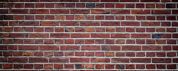 Fototapeta premium Old rustic brick wall panorama. Masonry background.