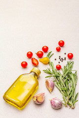 Cooking food background. Fresh rosemary, garlic clove, olive oil, black pepper