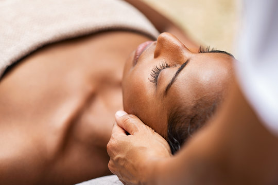 Black woman getting head massage