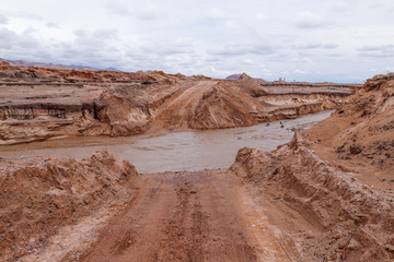 Fototapeta na wymiar Road interrupted after heavy rains near Toconao, San Pedro de Atacama, Chile - February, 2019