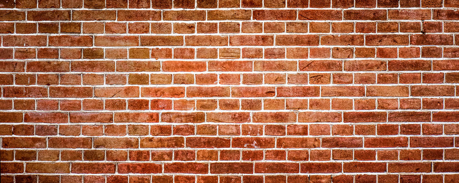 Red brick wall or masonryr, wide panorama or banner texture.